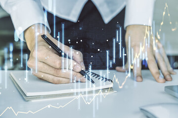 Poster - Multi exposure of abstract financial graph with hand writing in notebook on background, financial and trading concept