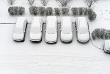 Winter Parking Lot Cars Under Snow Covered Cars Winter Season. Parked Cars Snowy Yard Top View. Cover Winter Yard Above View. Courtyard. Cold Weather. Frosty Morning. Fresh Snow Weather Conditions