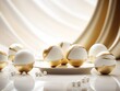 White and gold colored luxury elegantly bonbons at Christmas with cozy blur light background