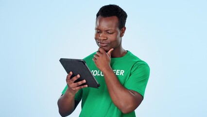 Poster - Thinking, tablet and happy man volunteer in studio with how to, sign up or donate on blue background. Digital, app and African male activist with charity registration, promo or community service faq