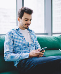 Wall Mural - successful male blogger searching information online
