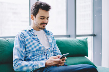 Wall Mural - successful male blogger searching information online