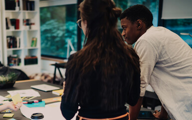 Wall Mural - Young coworkers discussing projects in office