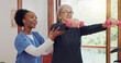 © Wesley JvR/peopleimages.com - Physical therapy, exercise and senior woman with dumbbell, weightlifting and training arms and muscle. Strong, fitness and old person with nurse or physiotherapist to help in rehabilitation workout