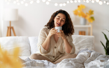 Wall Mural - woman enjoying sunny morning