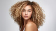 © Malambo/Peopleimages - AI - Portrait of young woman with blonde natural curly hair. Hair care, make-up and hair health