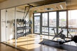 © Westend61 - Gym with equipment in modern office