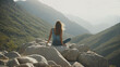 © birdmanphoto - Women sit on the mountaintop to relax