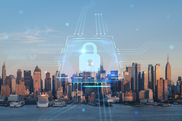 Wall Mural - New York City skyline from New Jersey over Hudson River, Midtown Manhattan skyscrapers at sunset, USA. The concept of cyber security to protect confidential information, padlock hologram