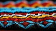 © fotogurme - Close-up of intricate Native American beadwork background with empty space for text