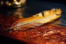 Golden Feather Coated In Close Up With Gold Paint Calligraphy Pen