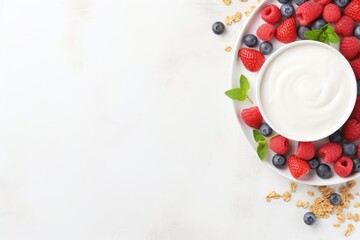 Sticker - Healthy breakfast or snack with Greek yogurt granola and fresh berries on white table viewed from above with space for text