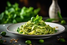Selective Focus Of Tagliatelle Pasta With Spinach And Green Pea Pesto