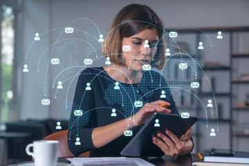 Wall Mural - businesswoman holding tablet device, touching screen. office workplace. concept of digital network, 