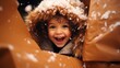 Child experiencing the Joy of  Christmas cheer and wonderful wrapped presents, happiness and smiling, Xmas holiday spirit and white winter snow.   
