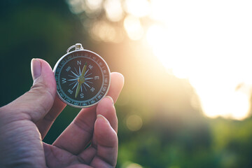 Wall Mural - Travel of tourists with compass. compass of tourists on mountain.