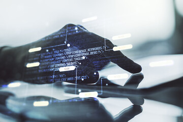 Aufkleber - Multi exposure of abstract programming language hologram and hand working with a digital tablet on background, artificial intelligence and machine learning concept