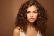 © Tetiana - Generative AI picture of Young beautiful girl model demonstrating perfect styling curly hair