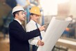 © BillionPhotos.com - Teamwork business people in construction site