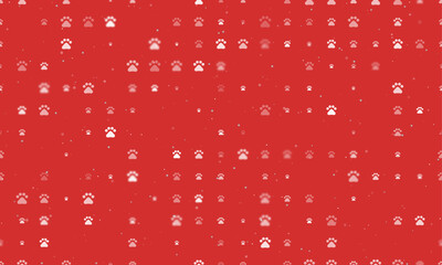 Poster - Seamless background pattern of evenly spaced white pet symbols of different sizes and opacity. Vector illustration on red background with stars