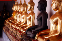 Row Of Golden Buddha Statues, Earth Witness Gesture, Wat Pho (Temple Of The Reclining Buddha), Bangkok, Thailand