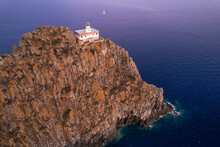 Punta Della Guardia Basalt Cliff With The Lighthouse At Dusk, Ponza Island, Tyrrhenian Sea, Pontine Islands, Latina Province, Latium (Lazio)