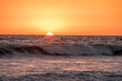 Sunset into the Pacific Ocean from a west coast beach in Southern California