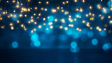 Fototapeta  - Fondo azul con bombillas y luces navideñas desenfocadas.