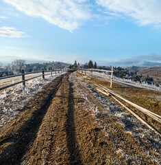 Canvas Print - winter coming. last days of autumn, morning in mountain countryside peaceful picturesque hoarfrosted