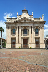 Canvas Print - Baroque facade of a historic building with a clock and columns on the island of Sicily, Italy