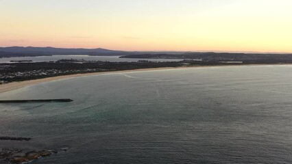 Poster - Swansea head at the entrance of Lake Macquarie to Pacific ocean – aerial 4k panorama.
