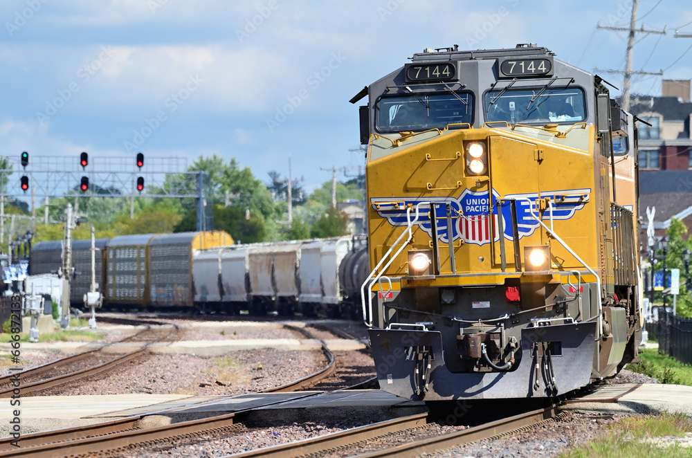 A Union Pacific Railroad freight train negotiating a long curve while ...