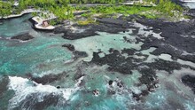 Aerial Beautiful Blue Ocean Honaunau Bay Lava Kona Hawaii 1. Beautiful Cove Bay With Blue Pacific Ocean Water. Vacation Destination. Black Volcanic Lava Rock. Tropical Landscape, Tourist Destination.