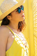 © fotografiche.eu - Beautiful girl dressed in yellow with glasses and hat