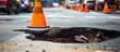 Dangerous sinkhole on a city street Crumbling road construction