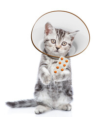 Poster - Cute tabby kitten wearing protective cone collar looking at camera and showing the tablets. Isolated on white background