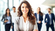 © Melinda Nagy - smiling attracting confident business woman posing with her staff