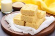 © Alfazet Chronicles - oatmeal protein bars placed on a yellow knit placemat