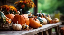 A Harvest Table Setting With Pumpkins And Gourds