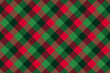 Christmas Plaid patten horizontal background. Vector checkered red and green plaid textured wallpaper. Traditional diagonal fabric print. Flannel winter plaid texture for fashion, print, design.