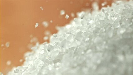 Poster - Salt crystals fall into a pile. Filmed on a high-speed camera at 1000 fps. High quality FullHD footage