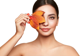 Wall Mural - portrait of beautiful young woman with autumn leafs. healthy clean fresh skin natural make up beauty