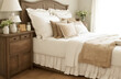 Rustic bedside chiffonier abreast bed with biscuit pillows of avant garde bedroom.