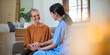© Natee Meepian - Empathy, trust and nurse caregiver holding hands with patient. consulting support and healthcare advice. Kindness, counseling and medical therapy in nursing home for hope, consultation and psychology