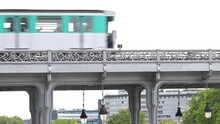 The Parisian Urban Subway (MP 73 Metro, Metropolitain) Passes Over A Bridge (pont De Bir-Hakeim Passy MP73 Line 6) In The French Capital, Paris, France. (July 2023)