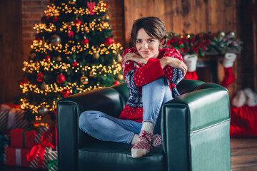 Poster - Full body photo of sit leather green couch young lady dreamy waiting midnight miracle 2024 happy new year isolated on xmas tree background