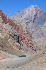 Rocky and glacial mountain landscape on a hiking trail from Iskandarkul to Chimtarga in Fann mountains, Tajikistan