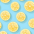 Lemon slices pattern. Flat lay composition on a pastel blue background.