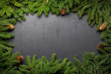 Wall Mural - Christmas fir tree branch frame over stone