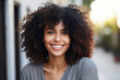 © Tetiana - Generative AI picture of beautiful young woman afro volume hair style in the street sunny day